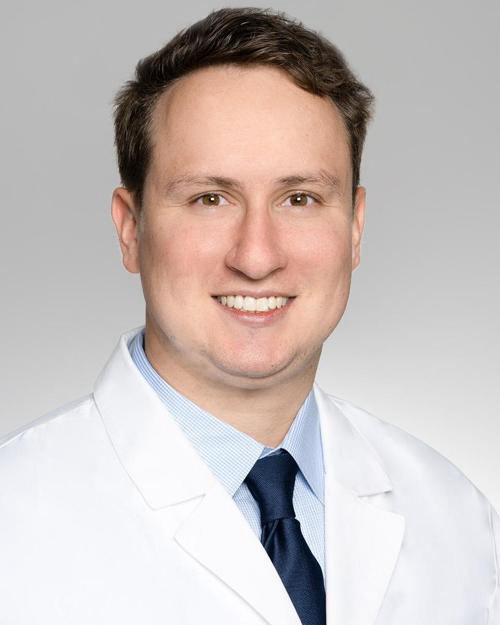 Professional headshot of Ezra Guttmann, DO